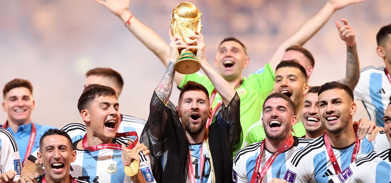 Lionel Messi lifts World Cup trophy in Qatar, 2022.