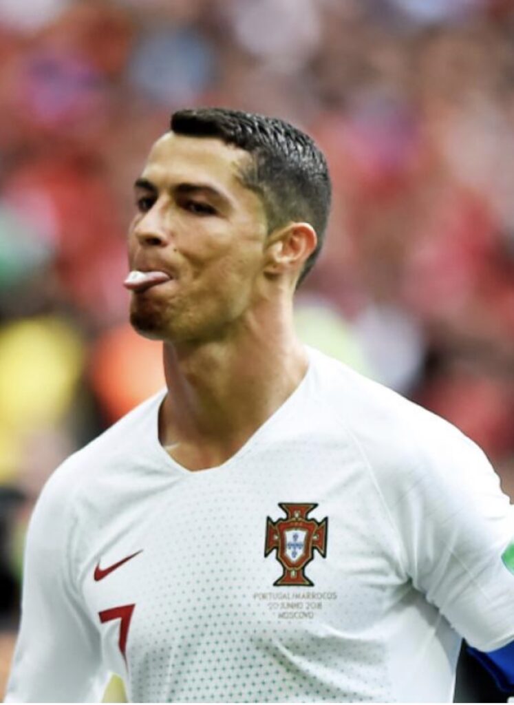Cristiano Ronaldo defiantly sticks out his tongue